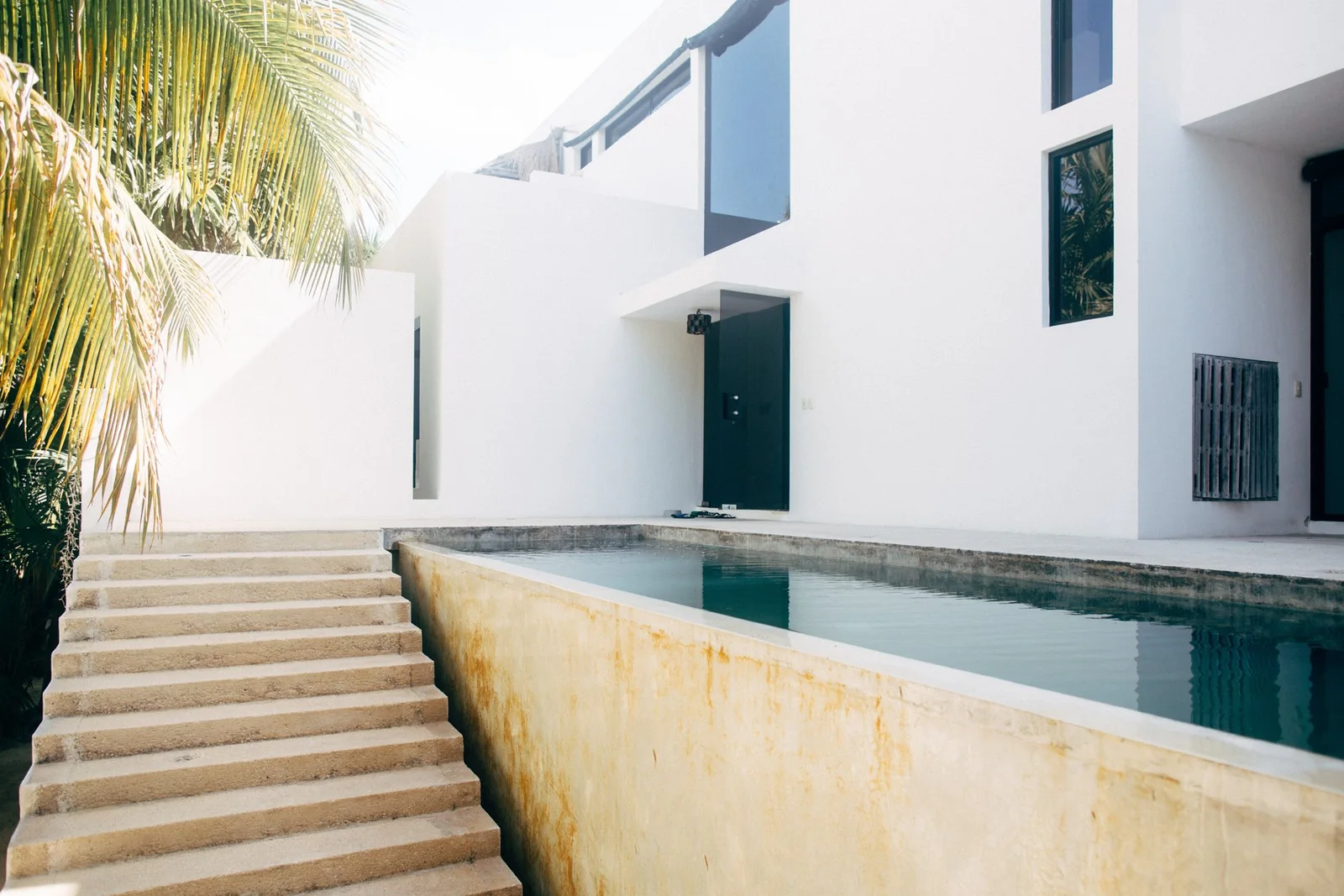 Poolside steps and warm stone in afternoon light