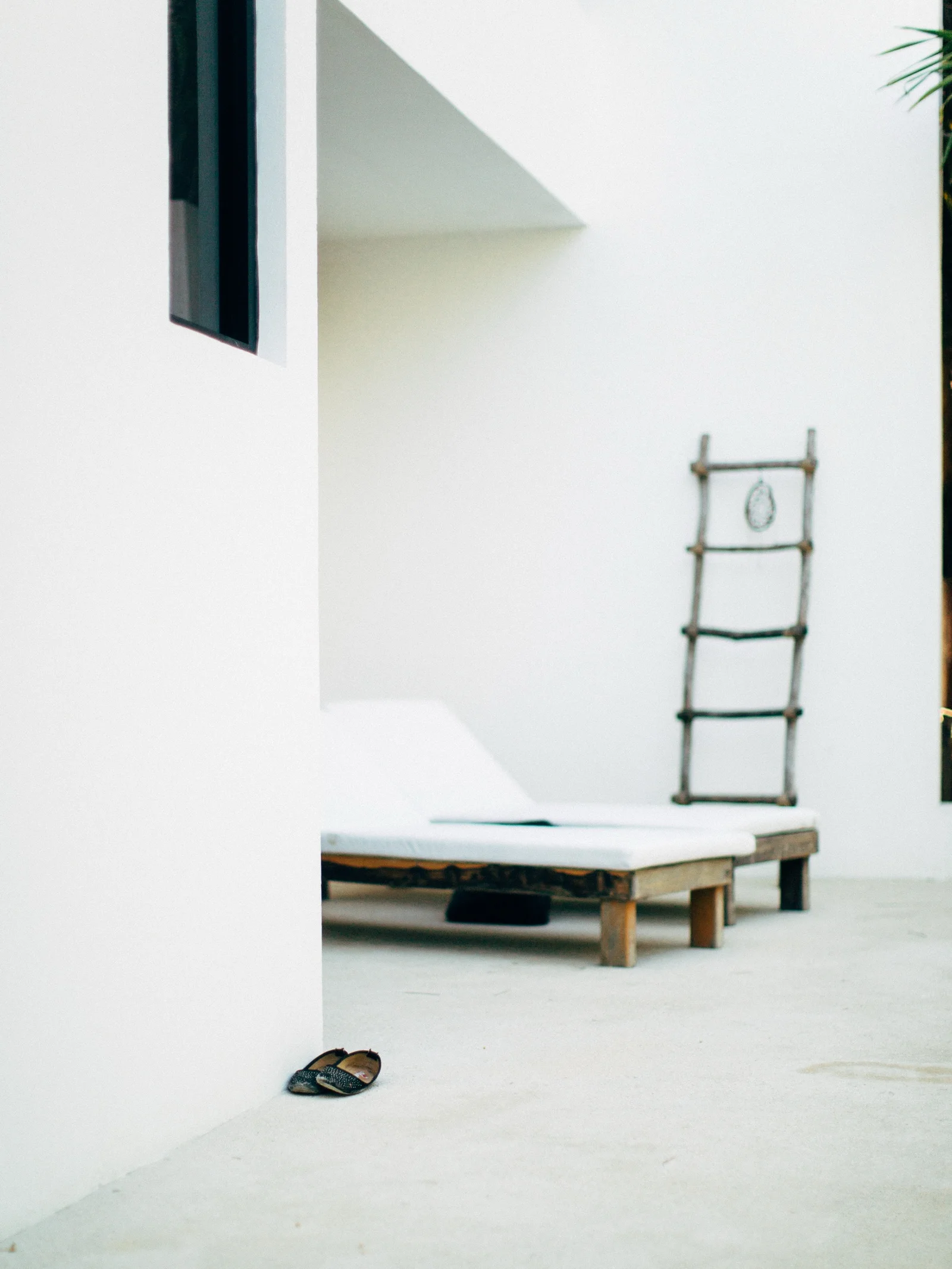 A spare white courtyard